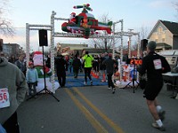 Race Photo  The 2009 running of the Holiday Hustle 5K put on by Running Fit in Dexter Michigan on a sunny but 28 degree on December 5, 2009. : 5K, Fitness, Race, Running, Kasdorf